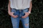 Valentine's date style cute and chice distressed cropped denim and white silk blouse.